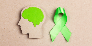 mental health awareness month symbol – a green ribbon